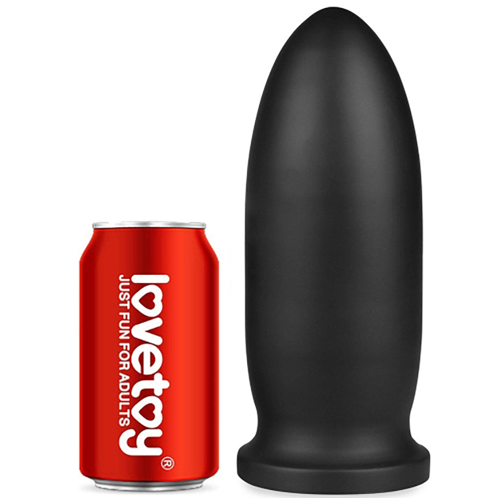 9 King Sized Anal Bomber svart PVC analtoy från Chambers of Love jämförd med LoveToy-burk för storleksjämförelse – 23 cm längd, 8,5 cm diameter, 961 gram vikt