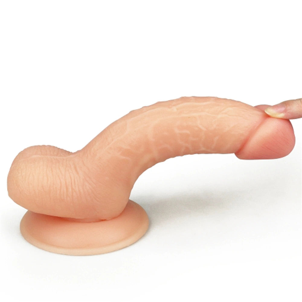 Ultra mjuk dildo DUDE 17,5 cm flexibilitet visas med ett finger – 100% ultra mjukt böjbart material, hud färg från Chambers of Love sortiment