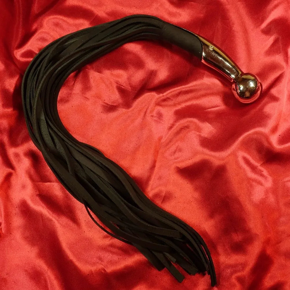 Läder flogger Silverkula
