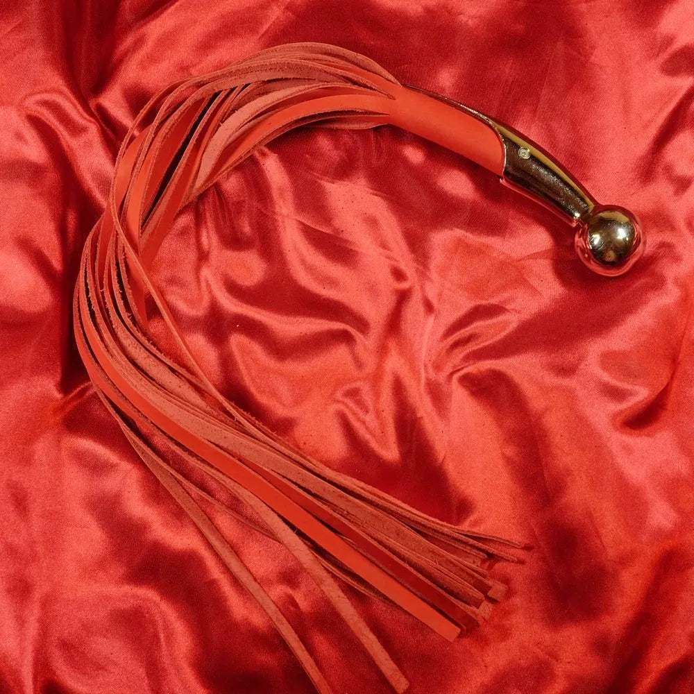 Läder flogger Silverkula