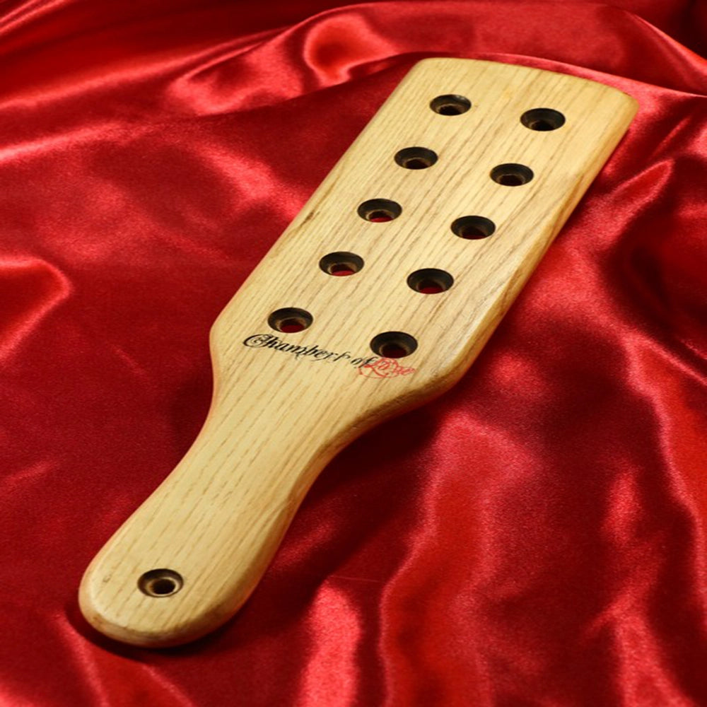 BDSM teakpaddel storlek S från Chambers of Love för impact play med precision